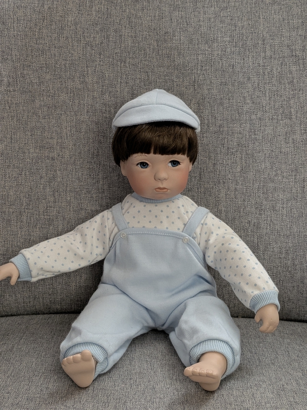 Blue porcelain Baby Doll in Polka Dot Outfit
